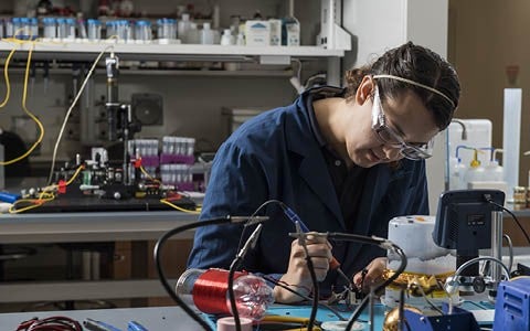 Student in the lab at the Electrical Engineering and Computer Engineering Research Experience for Undergrads Laboratory